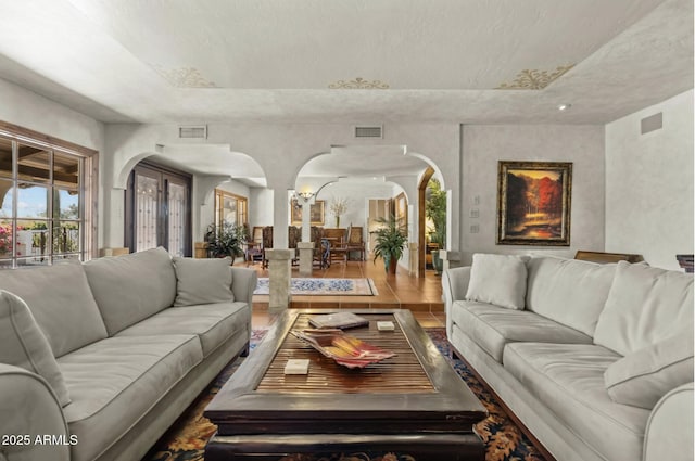 4726 E Sierra Vista Dr, Paradise Valley, AZ 85253 - living room with visible vents and arched walkways