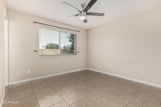 9609 N 44th Ave, Glendale, AZ 85302 - empty room featuring baseboards, ceiling fan, and tile patterned floors
