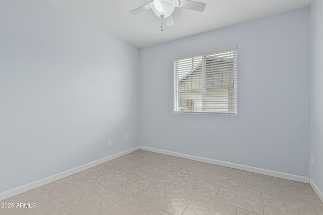 9609 N 44th Ave, Glendale, AZ 85302 - spare room with baseboards, ceiling fan, and light tile patterned flooring