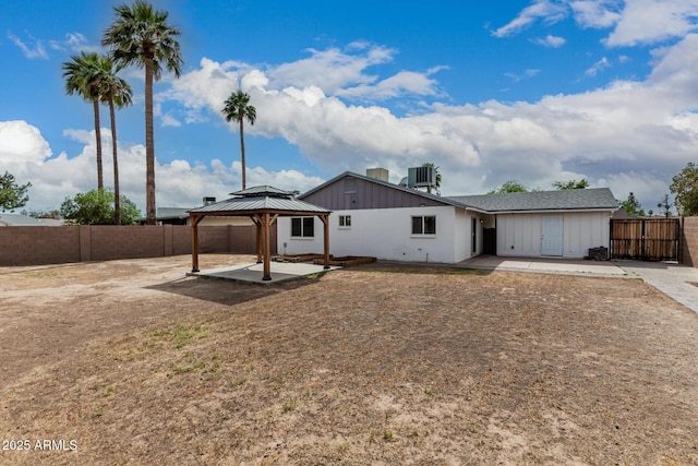 9609 N 44th Ave, Glendale, AZ 85302 - rear view of property with fence, a patio, a gazebo, and central AC unit