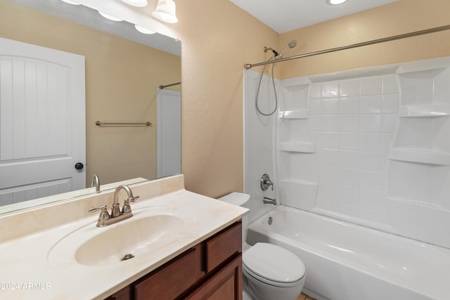 full bathroom with bathtub / shower combination, vanity, and toilet