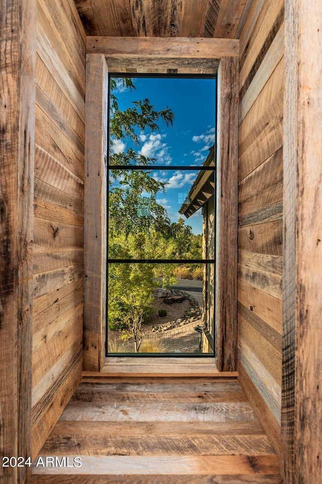 interior details featuring wood walls
