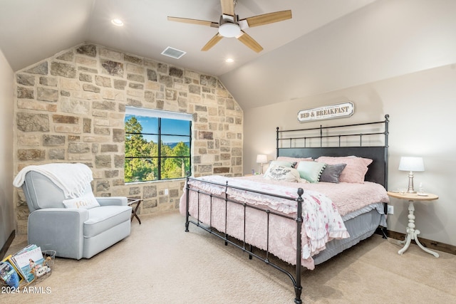 carpeted bedroom featuring vaulted ceiling and ceiling fan