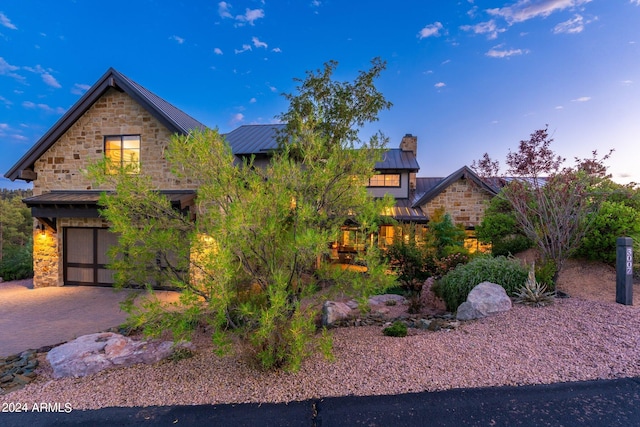 view of front of property featuring a garage