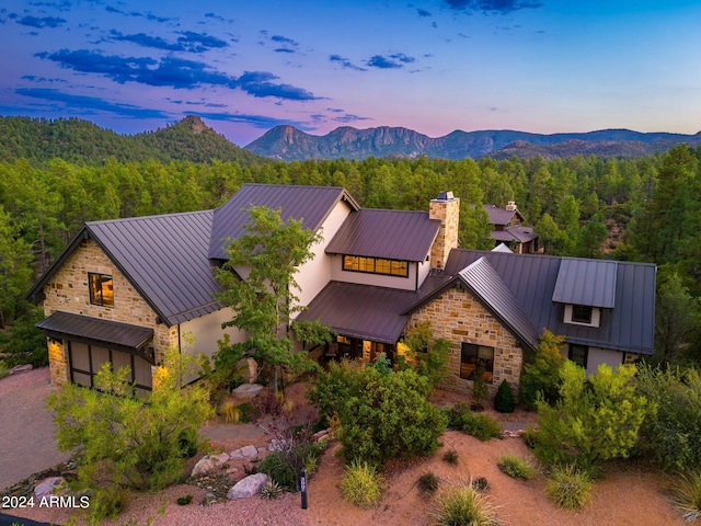 exterior space featuring a mountain view