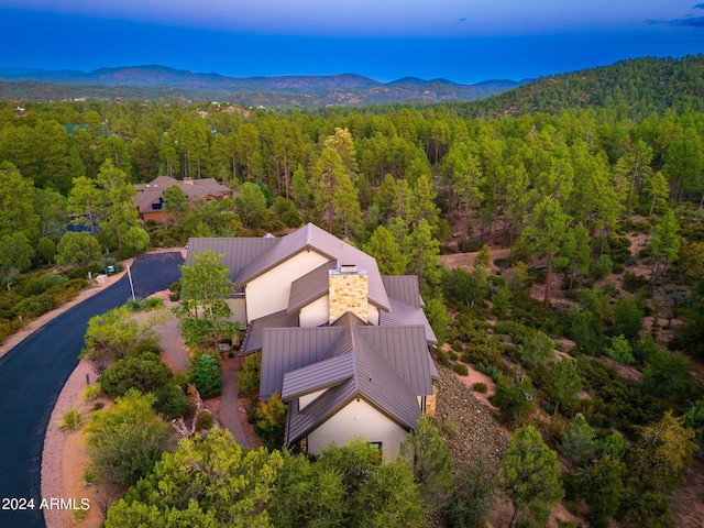 aerial view at dusk with a mountain view