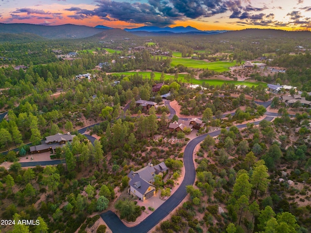 aerial view at dusk with a mountain view