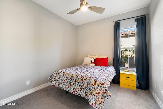 bedroom with ceiling fan and carpet flooring