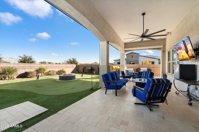 view of patio / terrace featuring an outdoor living space and ceiling fan