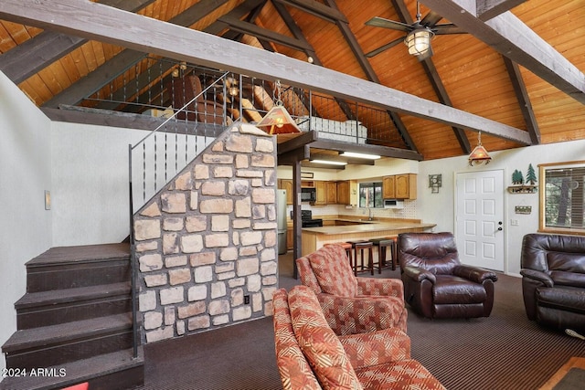 carpeted living area with a ceiling fan, lofted ceiling with beams, a sink, wood ceiling, and stairs