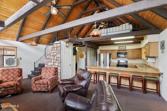 carpeted living room featuring beam ceiling, a ceiling fan, a sink, stairway, and wooden ceiling