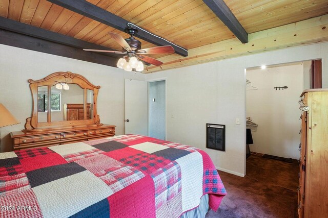 bedroom with wood ceiling, ceiling fan, dark colored carpet, and beamed ceiling