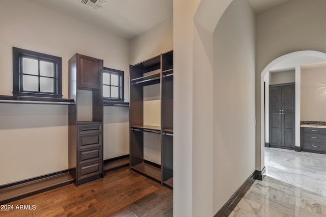 7254 E Sonoran Trl, Scottsdale, AZ 85266 - walk in closet featuring arched walkways