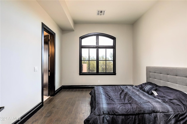 7254 E Sonoran Trl, Scottsdale, AZ 85266 - bedroom with dark wood finished floors and baseboards