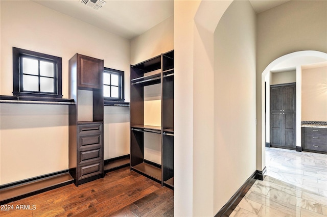 7254 E Sonoran Trl, Scottsdale, AZ 85266 - spacious closet featuring arched walkways and marble finish floors