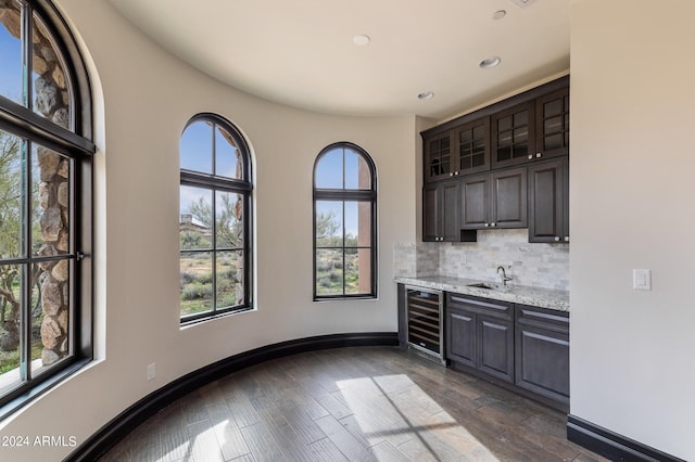 7254 E Sonoran Trl, Scottsdale, AZ 85266 - bar with wine cooler, tasteful backsplash, recessed lighting, and dark wood finished floors