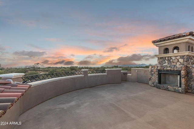 7254 E Sonoran Trl, Scottsdale, AZ 85266 - view of patio with an outdoor stone fireplace