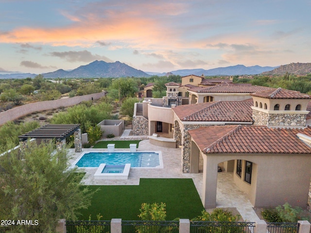 7254 E Sonoran Trl, Scottsdale, AZ 85266 - back of house with stucco siding, a mountain view, a patio area, and a tiled roof