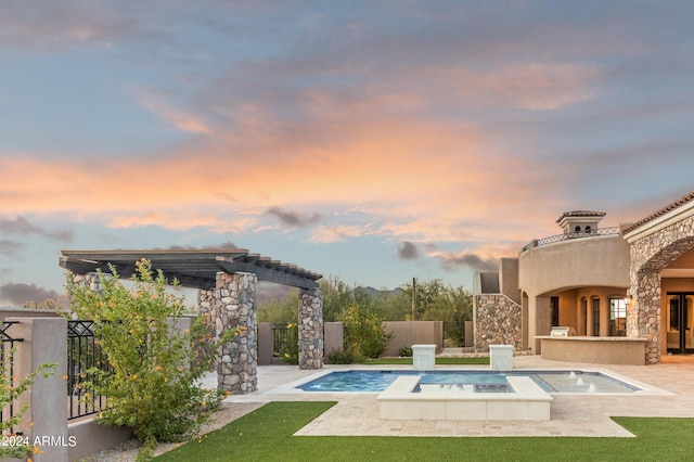 7254 E Sonoran Trl, Scottsdale, AZ 85266 - pool at dusk featuring a patio, a pergola, and a pool with connected hot tub