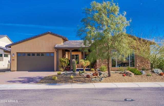 view of front of property with a garage