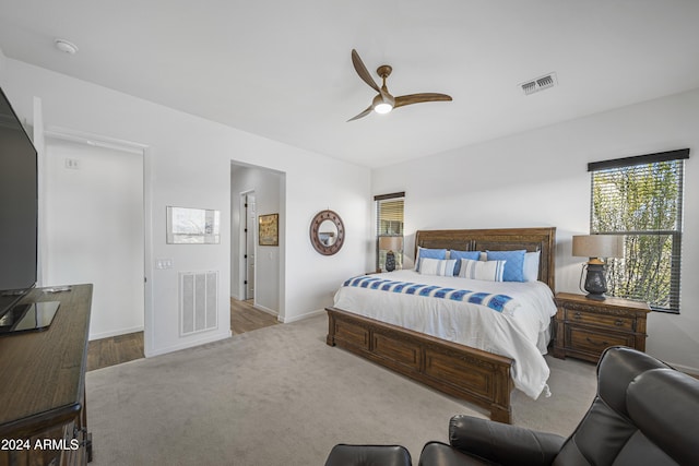 carpeted bedroom with ceiling fan