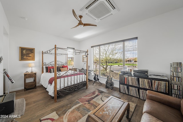 bedroom featuring ceiling fan and dark hardwood / wood-style floors