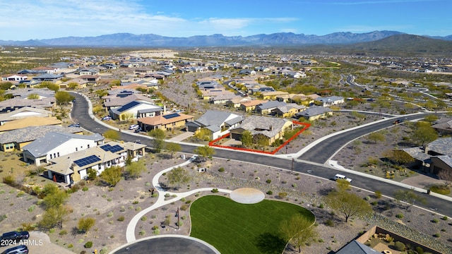 drone / aerial view featuring a mountain view