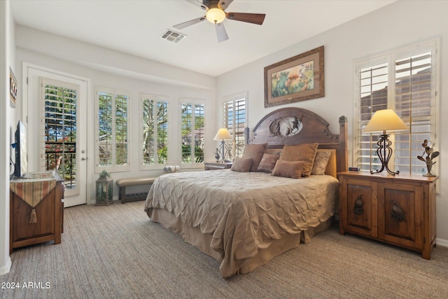 carpeted bedroom featuring ceiling fan and access to outside