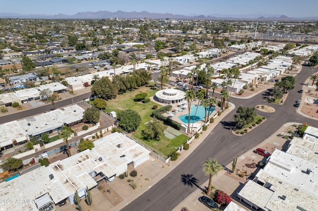 birds eye view of property featuring a mountain view