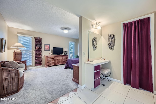 office area featuring light colored carpet and a textured ceiling