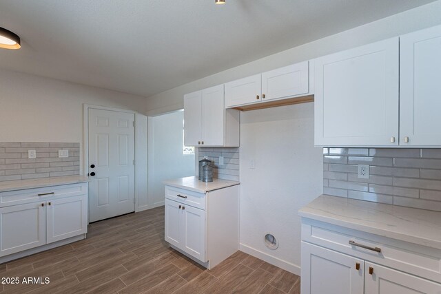 1466 E Nielson Ave, Mesa, AZ 85204 - kitchen with decorative backsplash, wood finished floors, and white cabinets
