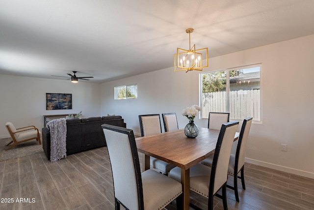 1466 E Nielson Ave, Mesa, AZ 85204 - dining area featuring a chandelier, dark wood-type flooring, and ceiling fan