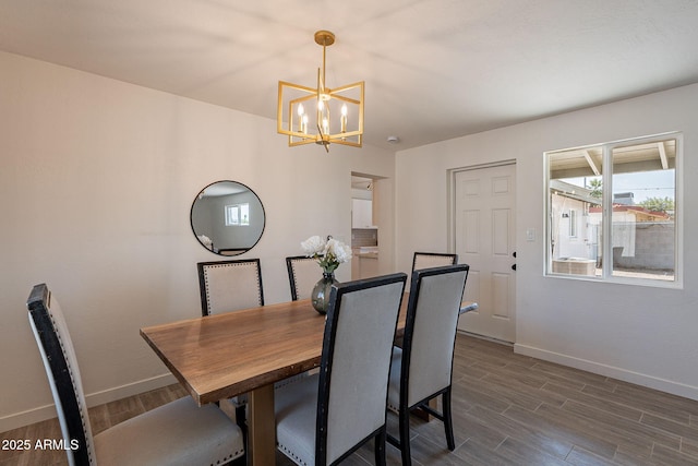 1466 E Nielson Ave, Mesa, AZ 85204 - dining space featuring a chandelier and dark wood-style flooring