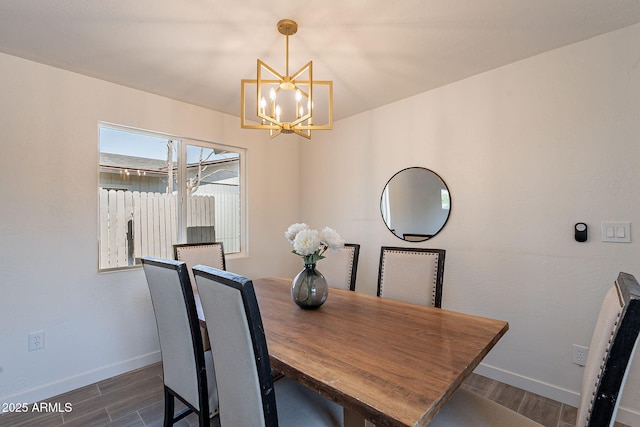 1466 E Nielson Ave, Mesa, AZ 85204 - dining space featuring a chandelier and wood finished floors