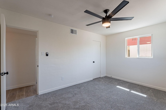 1466 E Nielson Ave, Mesa, AZ 85204 - carpeted empty room with a smoke detector and ceiling fan