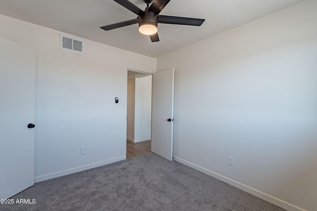 1466 E Nielson Ave, Mesa, AZ 85204 - unfurnished bedroom featuring carpet floors and ceiling fan
