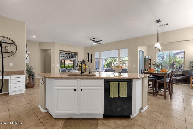 4293 E Sourwood Dr, Gilbert, AZ 85298 - kitchen featuring black dishwasher, a sink, open floor plan, light tile patterned flooring, and recessed lighting