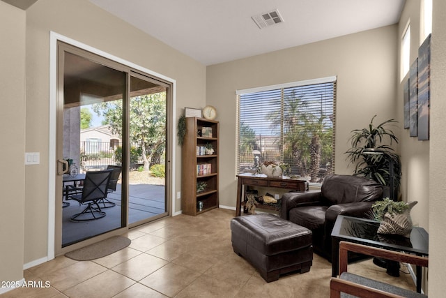 4293 E Sourwood Dr, Gilbert, AZ 85298 - sitting room with light tile patterned flooring and baseboards