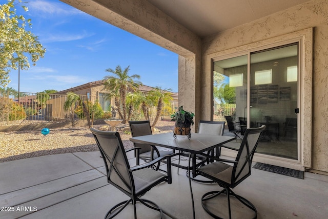 4293 E Sourwood Dr, Gilbert, AZ 85298 - view of patio / terrace with outdoor dining area and fence