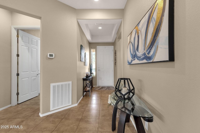 4293 E Sourwood Dr, Gilbert, AZ 85298 - hall featuring baseboards, tile patterned flooring, a raised ceiling, and recessed lighting