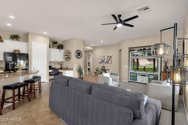 4293 E Sourwood Dr, Gilbert, AZ 85298 - living area with a ceiling fan, light tile patterned floors, and recessed lighting