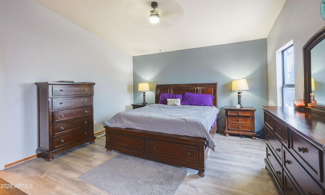 bedroom with lofted ceiling, light wood-type flooring, and ceiling fan