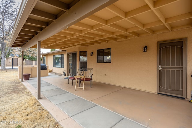 view of patio / terrace featuring a shed