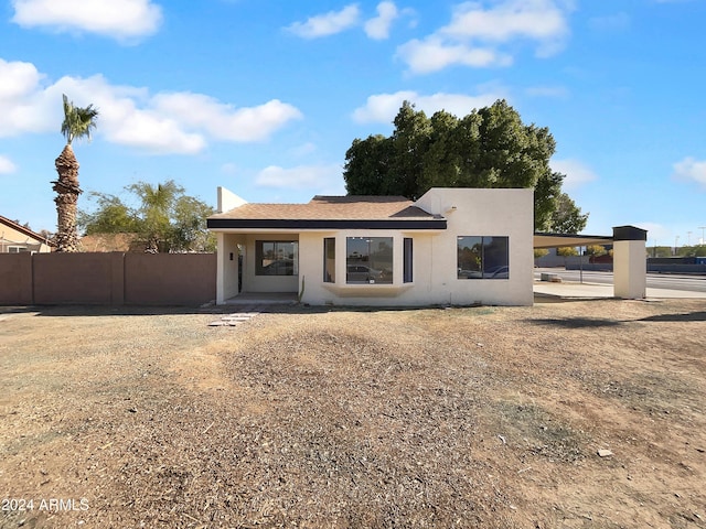 view of front facade featuring a carport