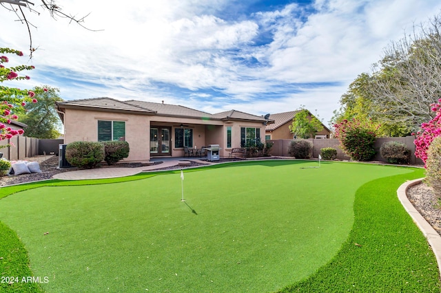 rear view of house with a patio area