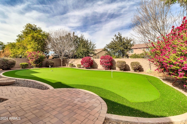 view of property's community with a patio area