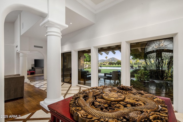8312 N Golf Dr, Paradise Valley, AZ 85253 - dining room featuring ornate columns, arched walkways, and visible vents