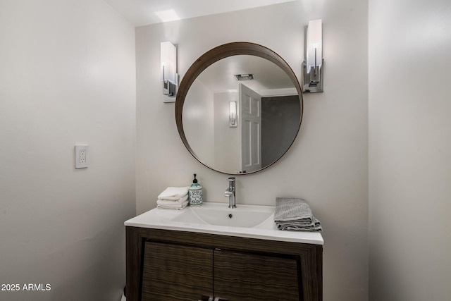 8312 N Golf Dr, Paradise Valley, AZ 85253 - bathroom with visible vents and vanity