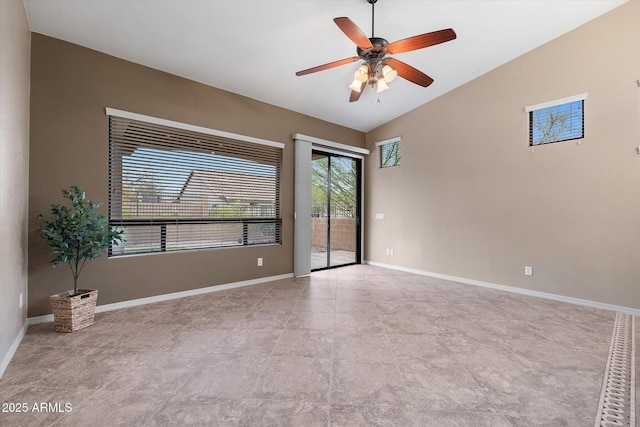 unfurnished room with lofted ceiling and ceiling fan