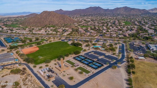 birds eye view of property featuring a mountain view